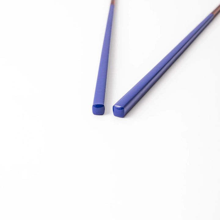 Pair of cobalt blue Japanese traditional color bamboo chopsticks with fine tips for an elegant and precise dining experience