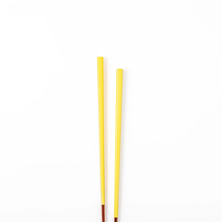 Pair of dandelion yellow Japanese traditional color bamboo chopsticks with fine tips for precise and elegant dining