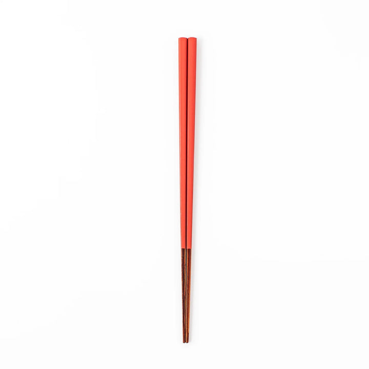 Pair of safflower red Japanese traditional color bamboo chopsticks with fine tips for an elegant and precise dining experience