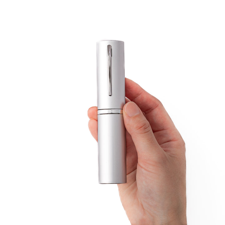 Sleek silver aluminum Japanese travel chopsticks case designed to look like a premium pen for stylish storage