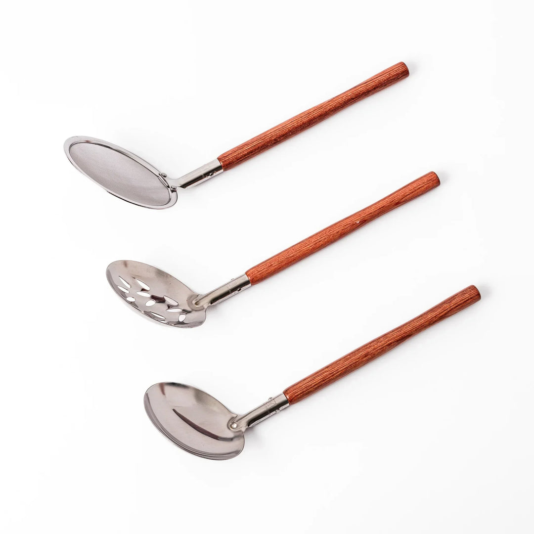 Japanese cooking ladle set with stainless heads and wooden handles including skimmer slotted spoon and soup ladle.