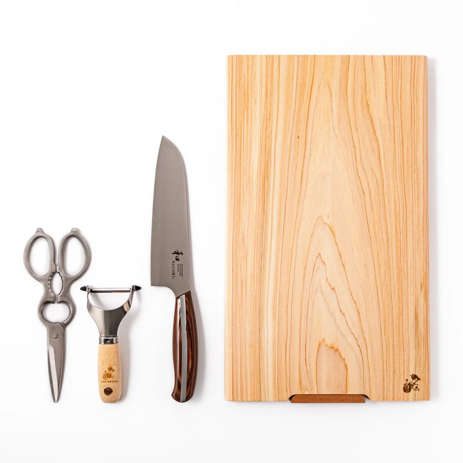 Knife and Prep Basics Set with Japanese chefs knife shears peeler and wooden board for daily cooking.