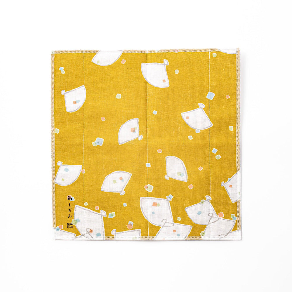 Kyoto Yuzen dyed Kaya cotton kitchen cloth featuring a mustard yellow background with colorful Japanese folding fan patterns