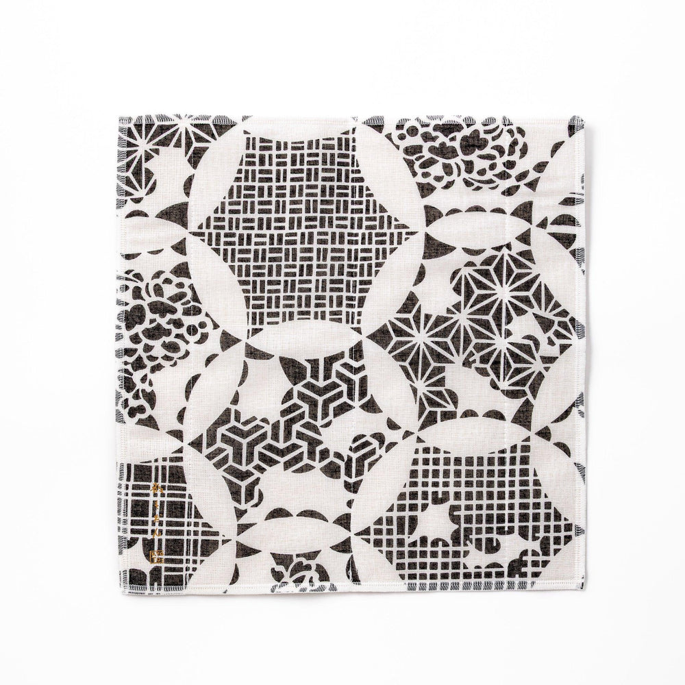 Kyoto Yuzen dyed Kaya cotton kitchen cloth featuring a monochrome Japanese Temari ball pattern with various traditional motifs