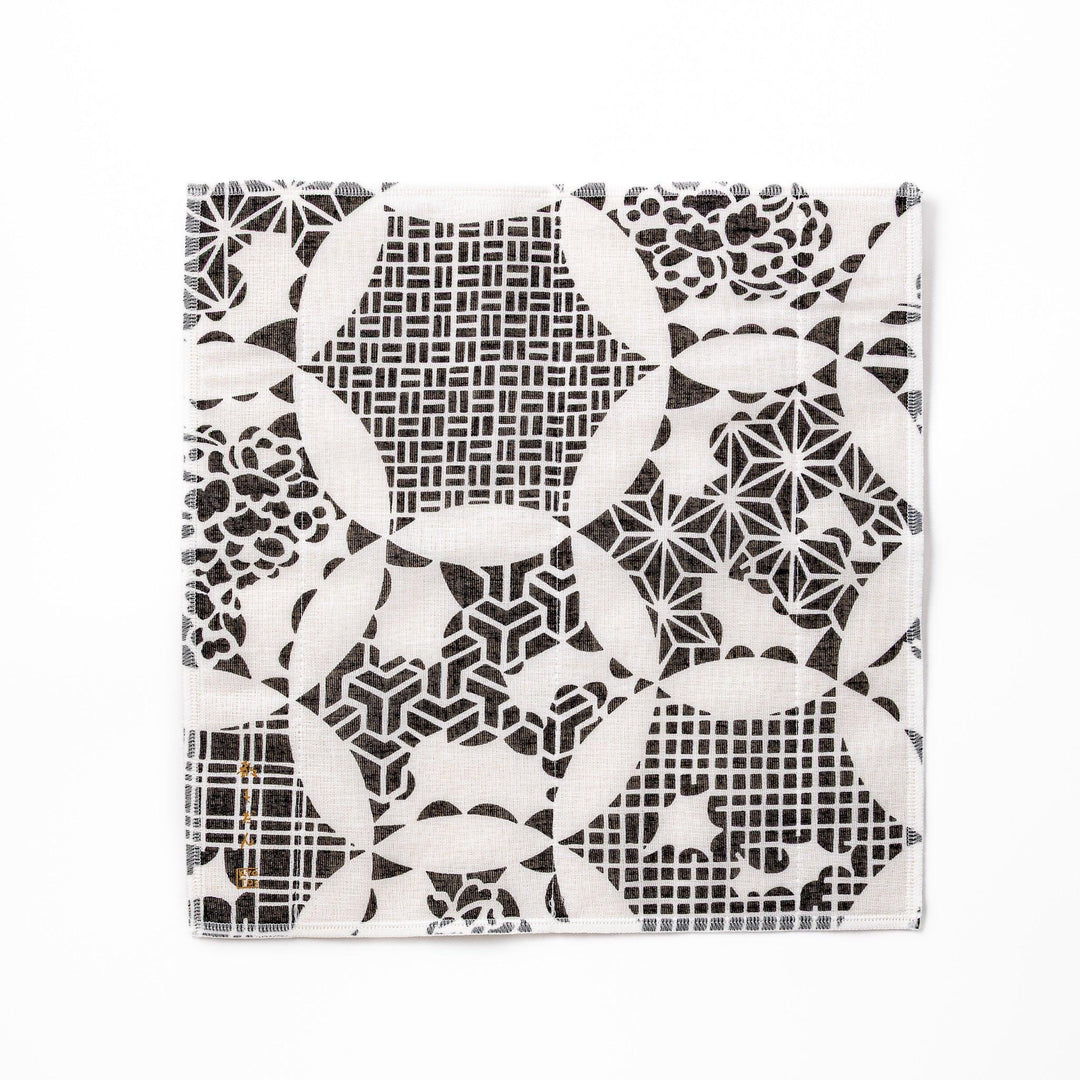 Kyoto Yuzen dyed Kaya cotton kitchen cloth featuring a monochrome Japanese Temari ball pattern with various traditional motifs