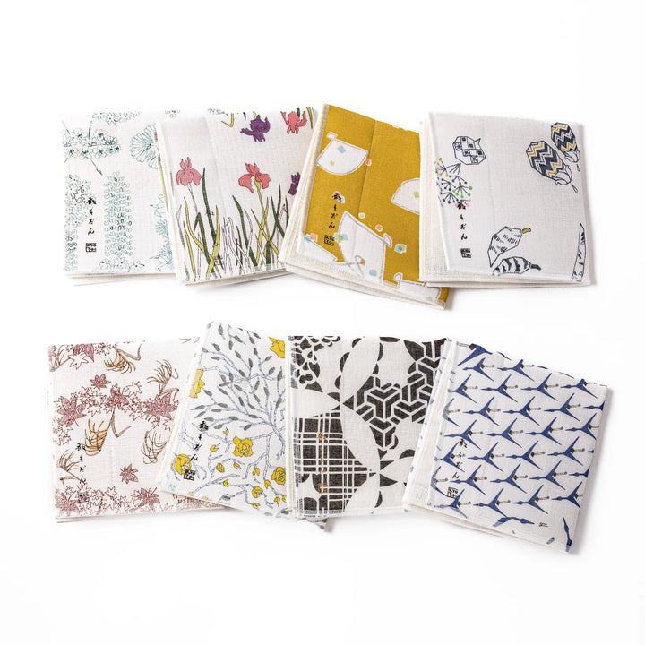 Assorted Kyoto Yuzen dyed cotton kitchen cloths featuring traditional Japanese floral and geometric patterns in vibrant colors