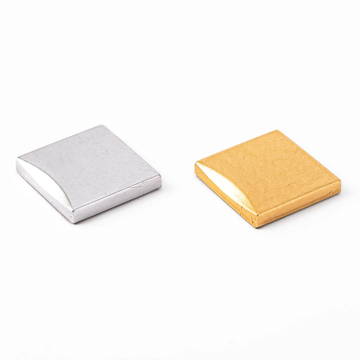 Gold and silver square chopstick rests