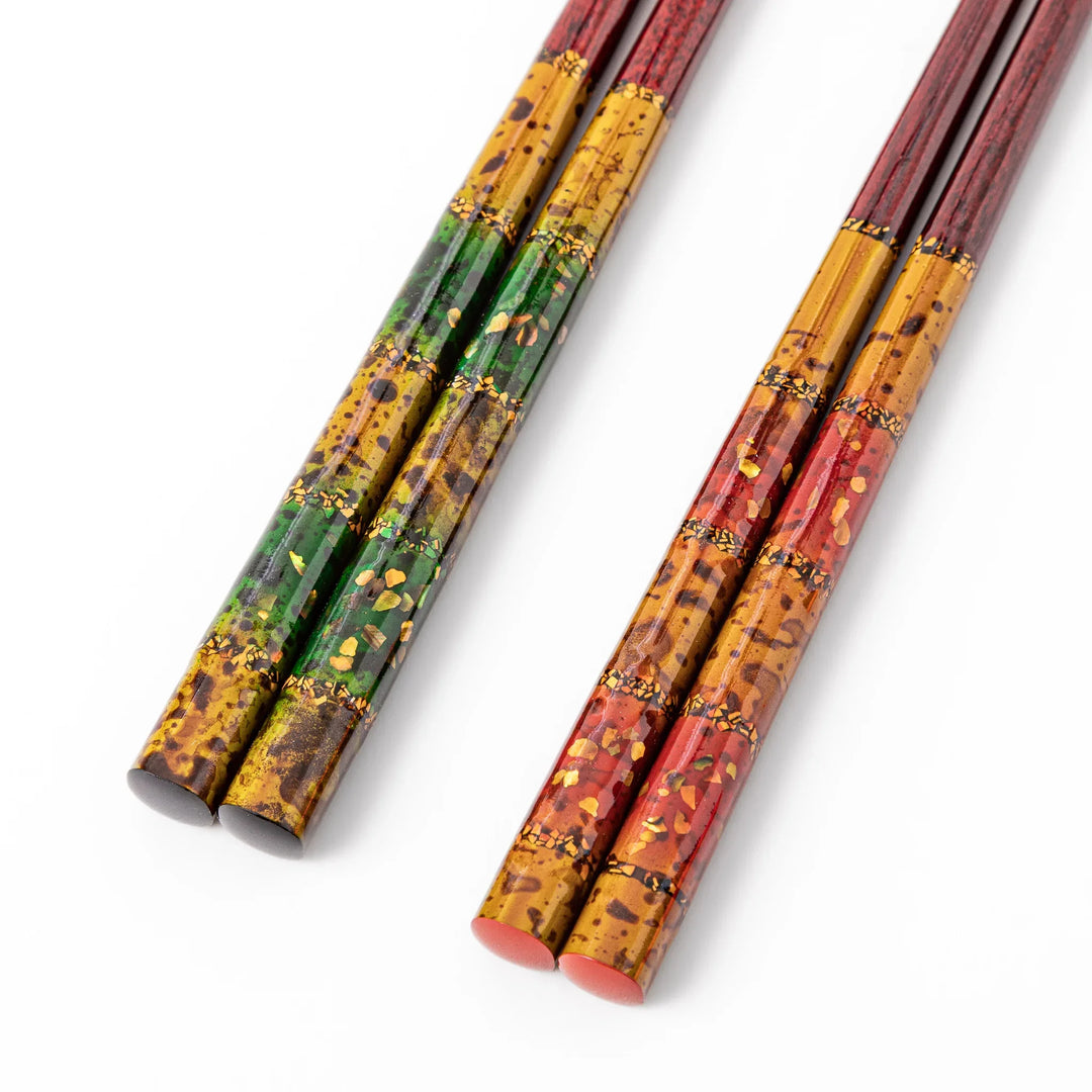 Close up of Japanese lacquer chopsticks with gold leaf detailing