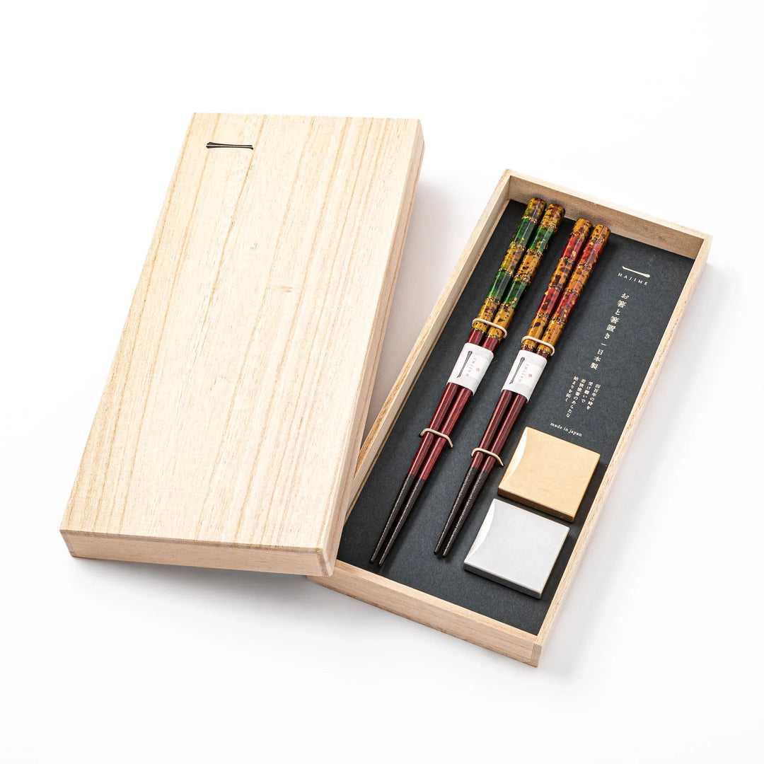 Japanese lacquer chopstick set with gold and silver chopstick rests in wooden gift box