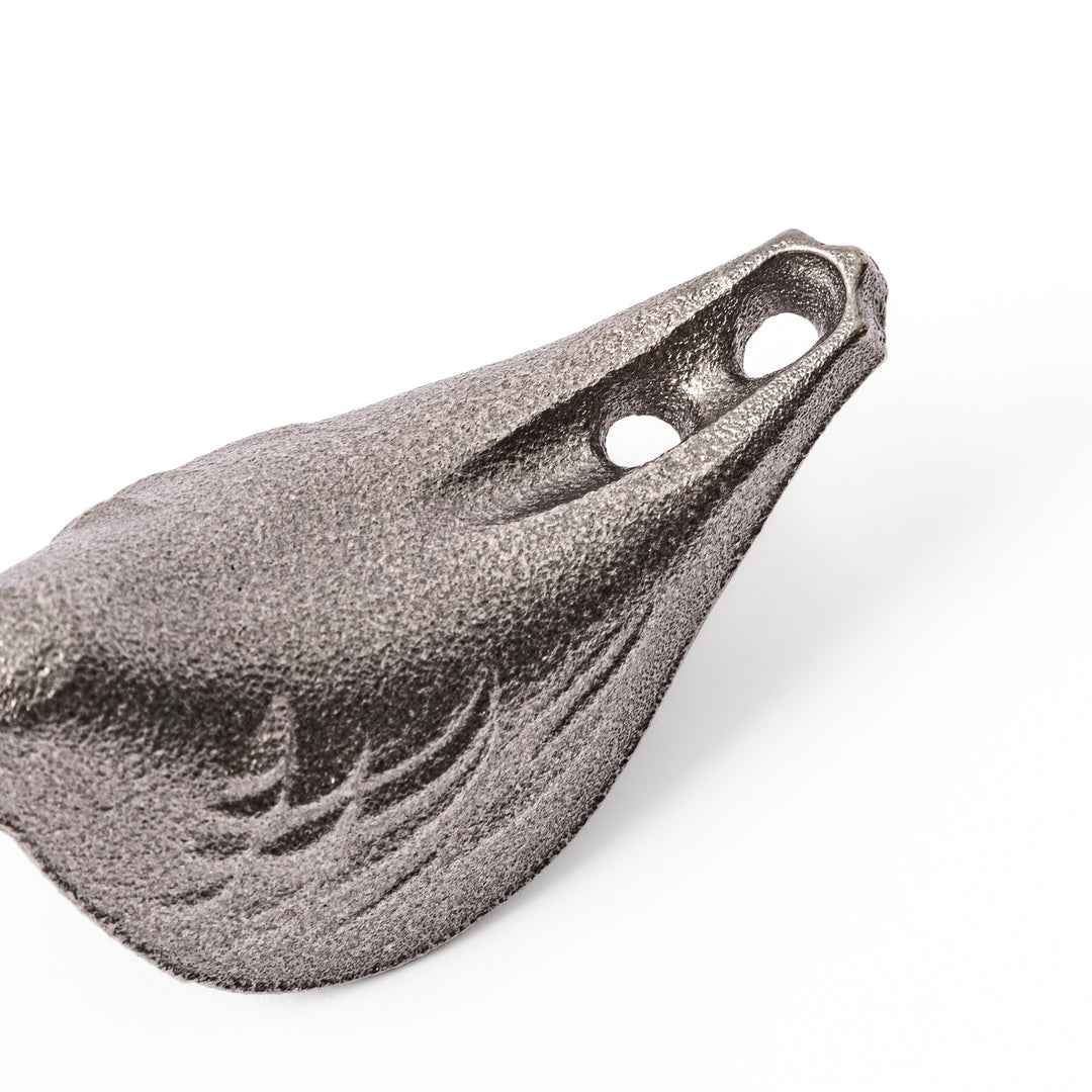 Little Bird Japanese Cast Iron Fish for boiling water to add iron supplement displayed on a plain white background