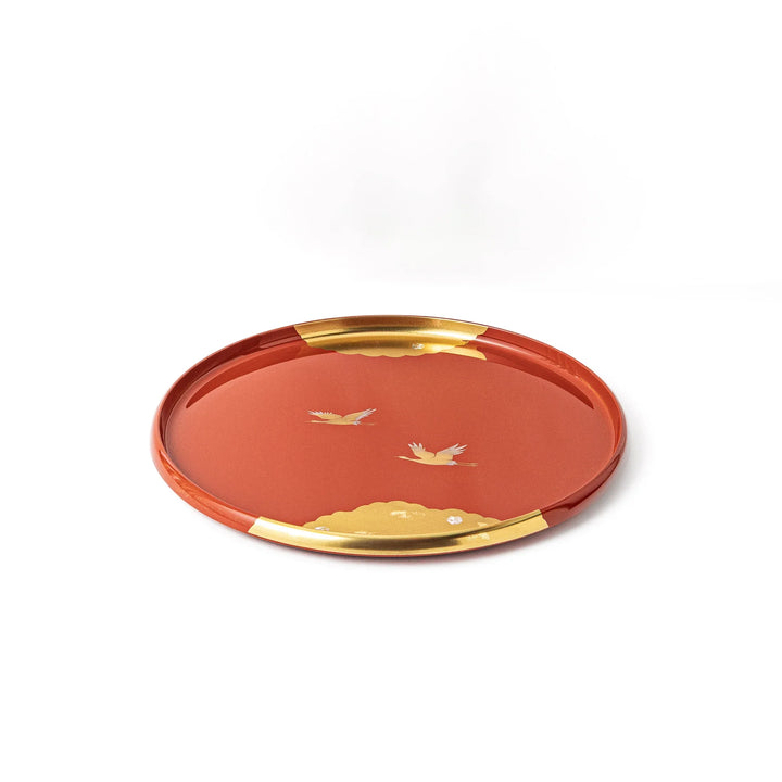 Japanese lacquer serving tray with flying crane motif in gold on red finish elegant round design for traditional table setting