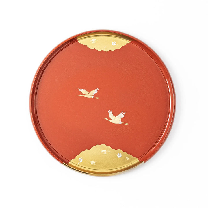 Japanese lacquer serving tray with flying crane motif in gold on red finish elegant round design for traditional table setting