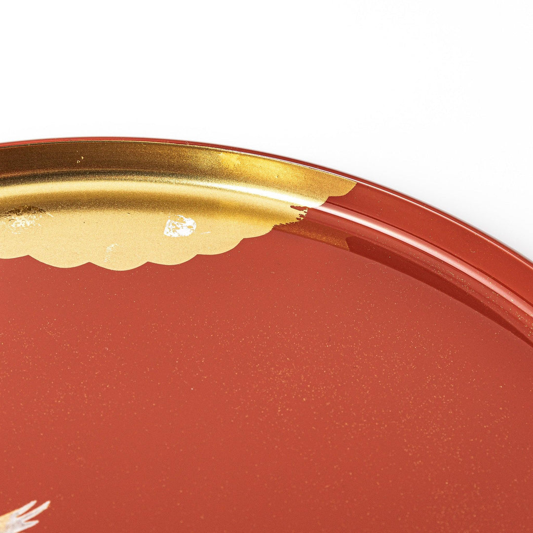 Japanese lacquer serving tray with flying crane motif in gold on red finish elegant round design for traditional table setting