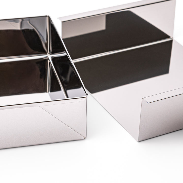 Japanese stainless steel Nagashikan jelly mold shown next to its separated removable inner tray on white background