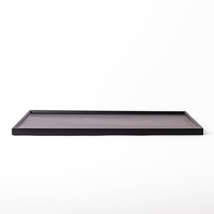 Modern Japanese Lacquer Serving Tray in sleek black with a textured horizontal grain pattern and subtle side grooves for easy handling.