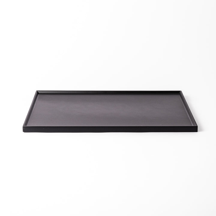 Modern Japanese Lacquer Serving Tray in sleek black with a textured horizontal grain pattern and subtle side grooves for easy handling.