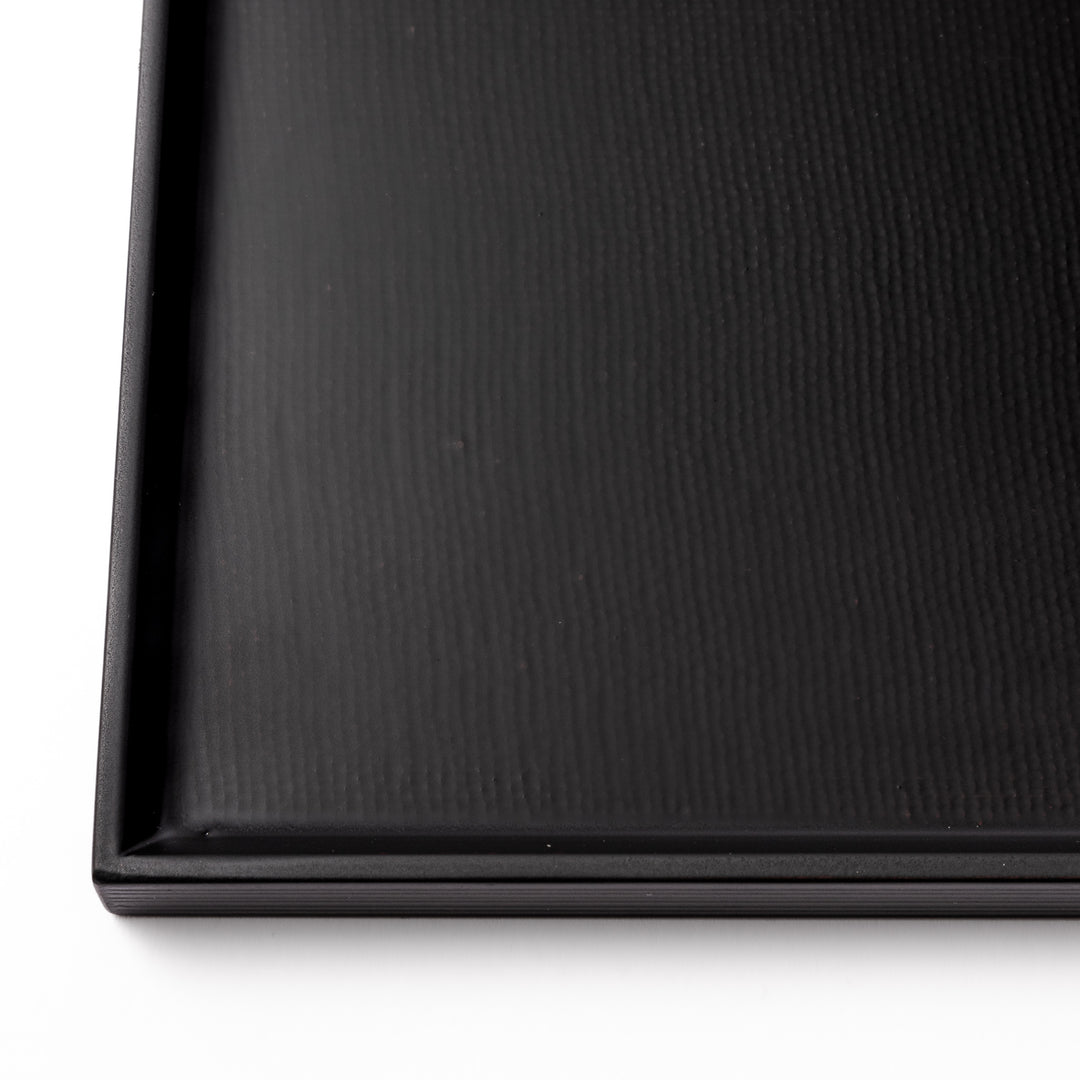 Modern Japanese Lacquer Serving Tray in sleek black with a textured horizontal grain pattern and subtle side grooves for easy handling.