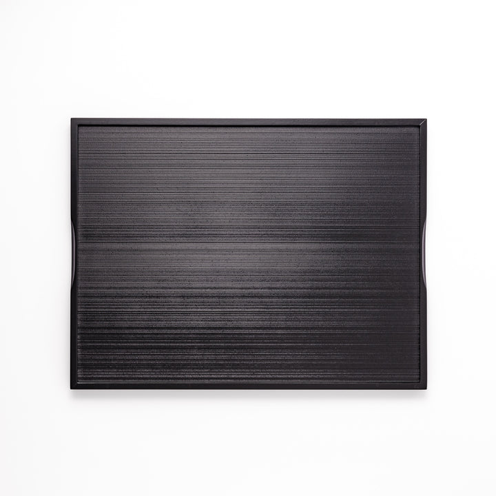 Modern Japanese Lacquer Serving Tray in sleek black with a textured horizontal grain pattern and subtle side grooves for easy handling.