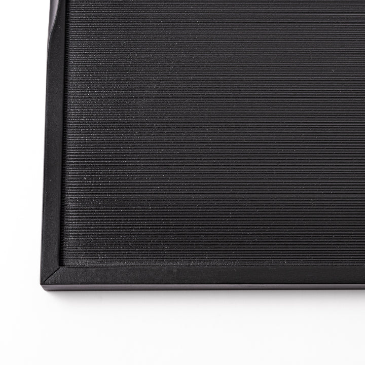 Modern Japanese Lacquer Serving Tray in sleek black with a textured horizontal grain pattern and subtle side grooves for easy handling.