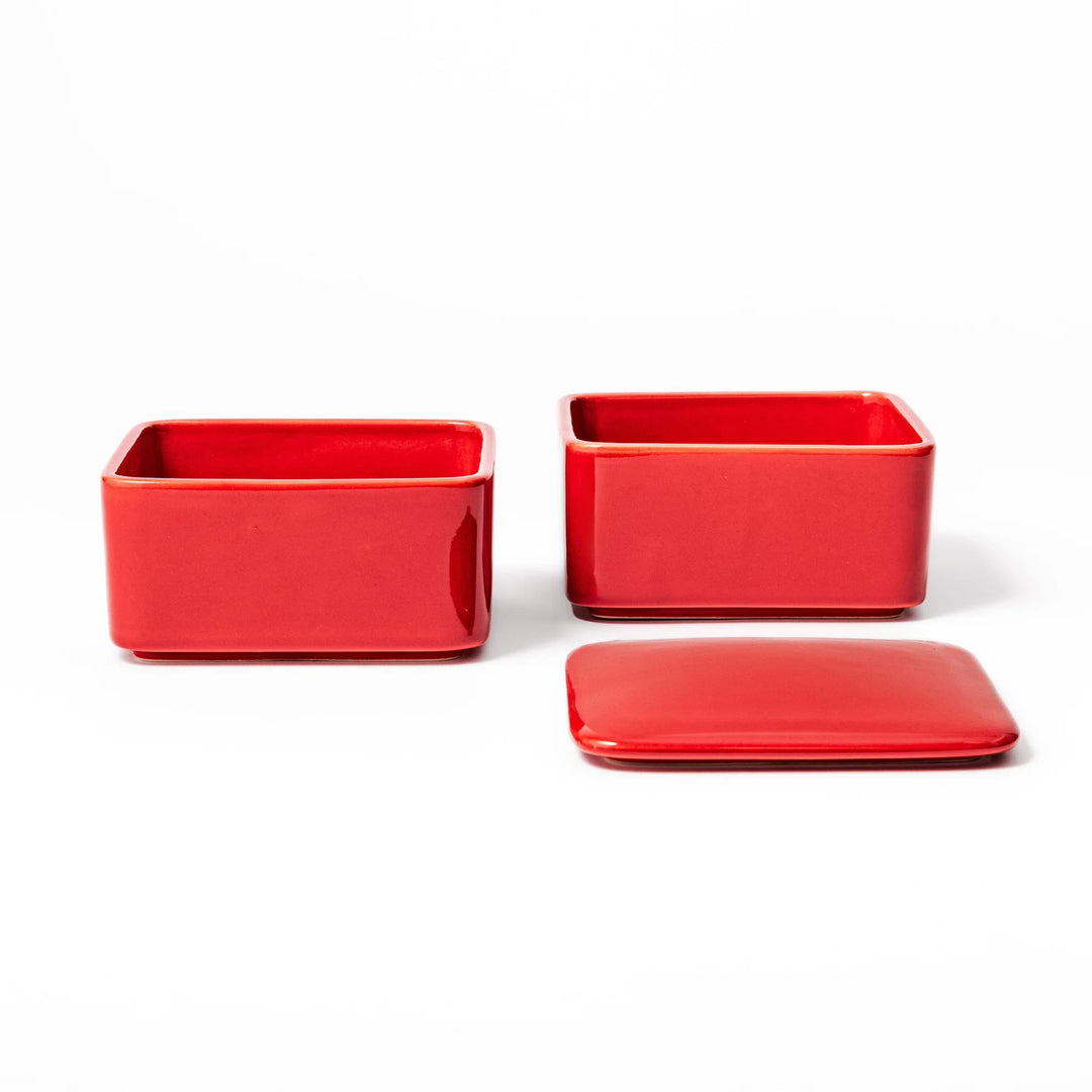 Vibrant red Japanese porcelain bento box set, two-tiered square design for stylish, modern dining and versatile meal presentation.