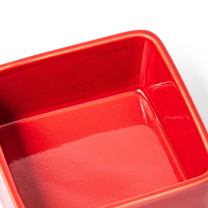 Vibrant red Japanese porcelain bento box set, two-tiered square design for stylish, modern dining and versatile meal presentation.