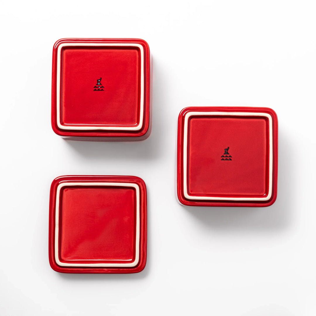Vibrant red Japanese porcelain bento box set, two-tiered square design for stylish, modern dining and versatile meal presentation.