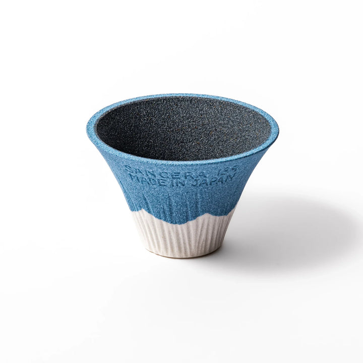 Sky blue Mount Fuji ceramic coffee filter with snowy peak, handcrafted in Japan for reusable pour-over brewing and unique kitchen decor.