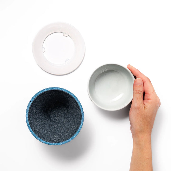 Sky blue Mount Fuji ceramic coffee filter with snowy peak, handcrafted in Japan for reusable pour-over brewing and unique kitchen decor.
