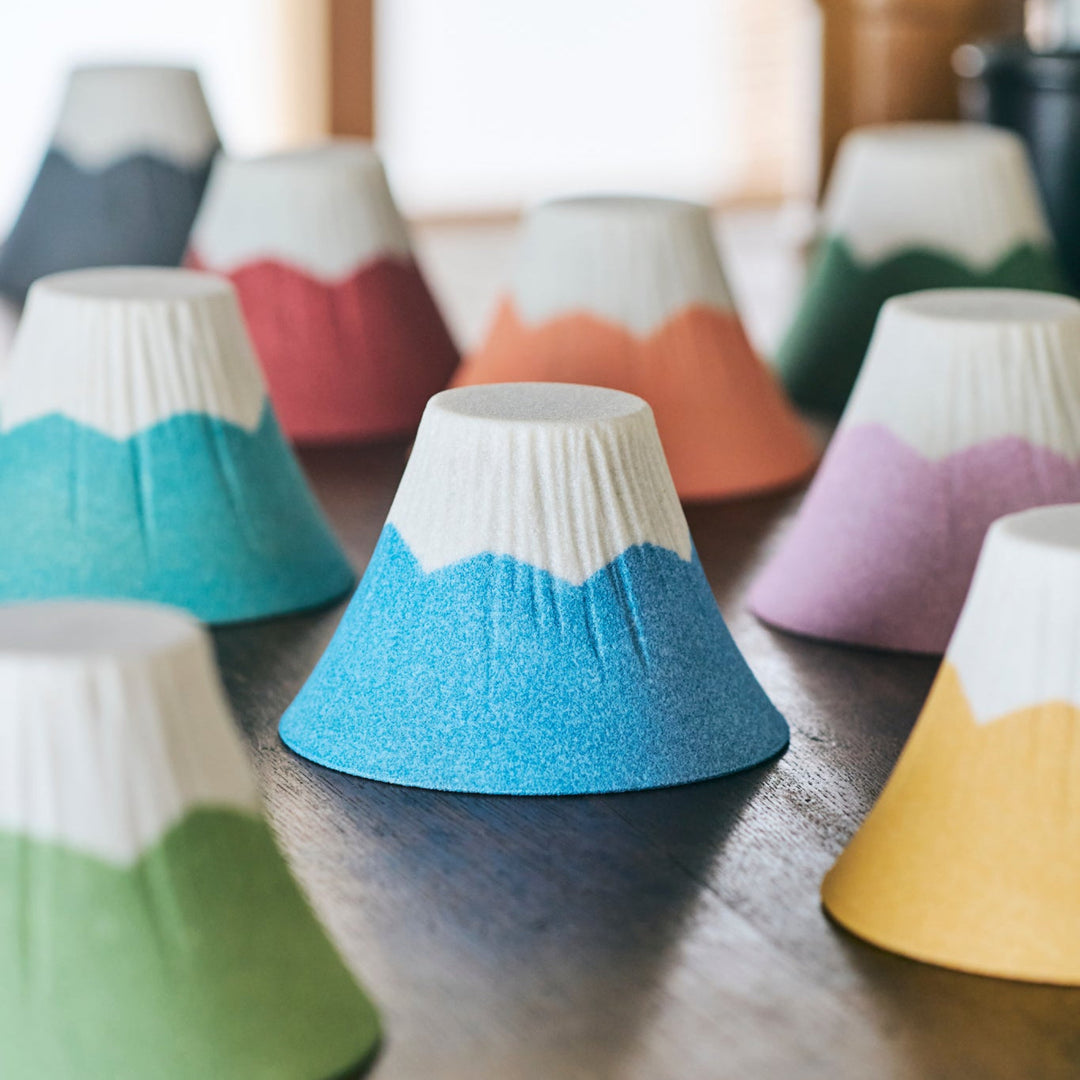 Colorful ceramic coffee filters shaped like Mount Fuji, handcrafted in Japan to bring artistry and calm to your morning ritual.