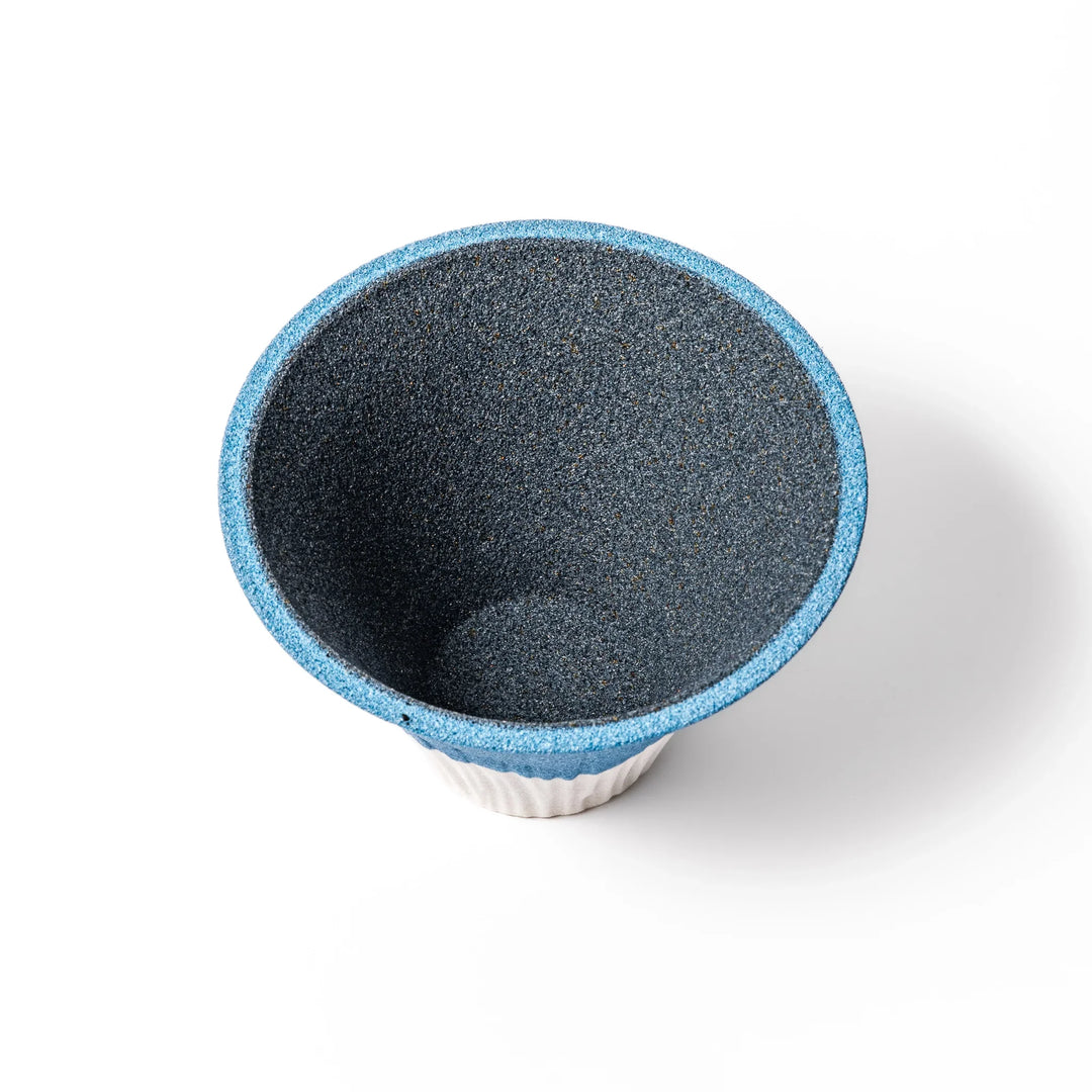 Sky blue Mount Fuji ceramic coffee filter with snowy peak, handcrafted in Japan for reusable pour-over brewing and unique kitchen decor.