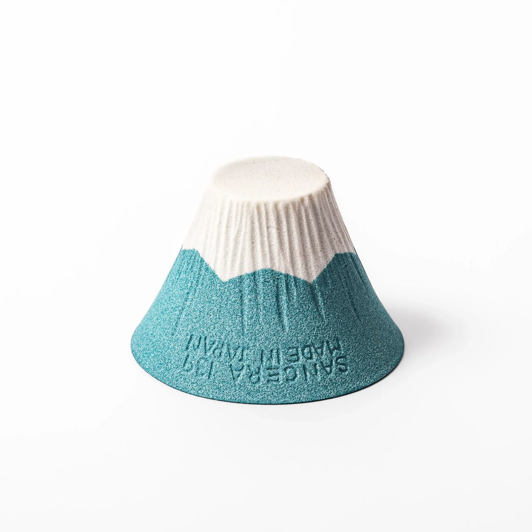 Turquoise Mount Fuji ceramic coffee filter with snowy peak design, handcrafted in Japan for reusable pour-over brewing and unique kitchen decor.