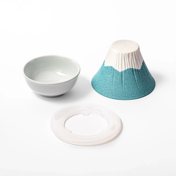 Turquoise Mount Fuji ceramic coffee filter with snowy peak design, handcrafted in Japan for reusable pour-over brewing and unique kitchen decor.