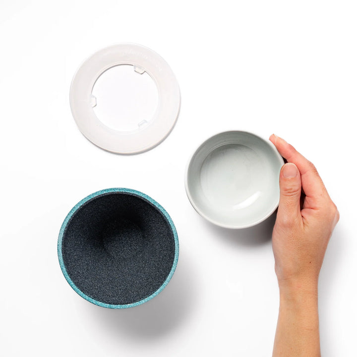 Turquoise Mount Fuji ceramic coffee filter with snowy peak design, handcrafted in Japan for reusable pour-over brewing and unique kitchen decor.