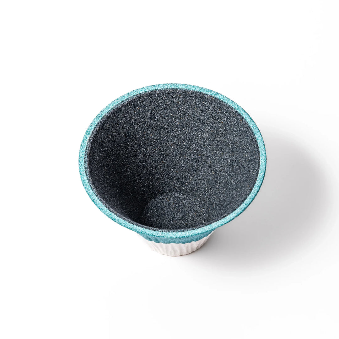 Turquoise Mount Fuji ceramic coffee filter with snowy peak design, handcrafted in Japan for reusable pour-over brewing and unique kitchen decor.