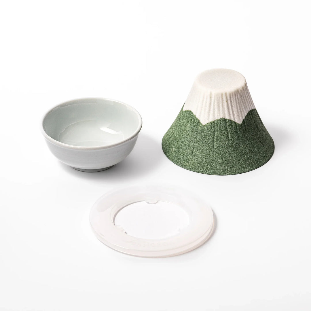 Matcha green Mount Fuji ceramic coffee filter with snowy peak design, handcrafted in Japan for reusable pour-over brewing and stylish kitchen decor.