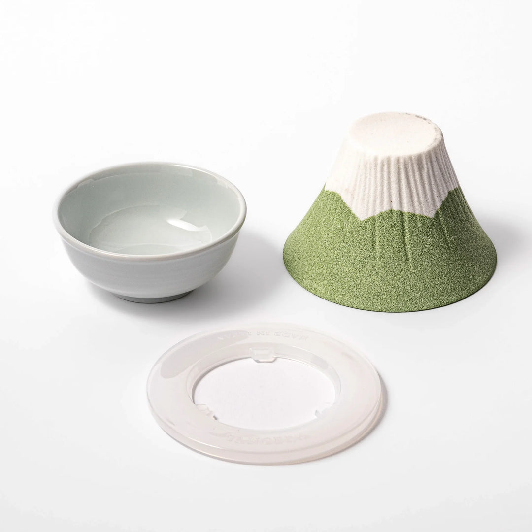 Wasabi green Mount Fuji ceramic coffee filter with snowy peak design, handmade in Japan for reusable pour-over brewing and kitchen decor.