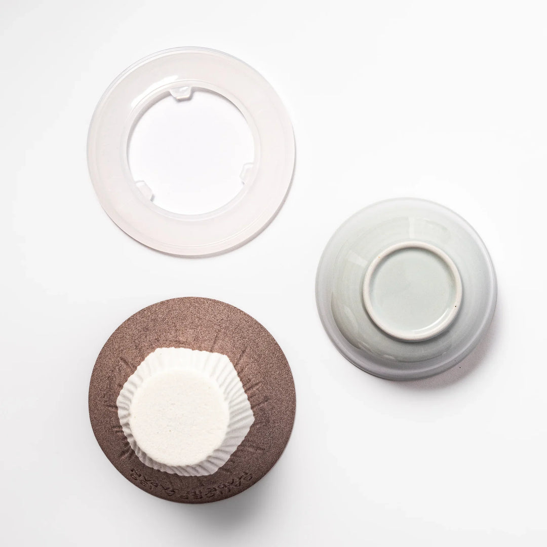 Cocoa Mount Fuji ceramic coffee filter with snowy peak design, handmade in Japan for eco-friendly pour-over brewing and kitchen decor.