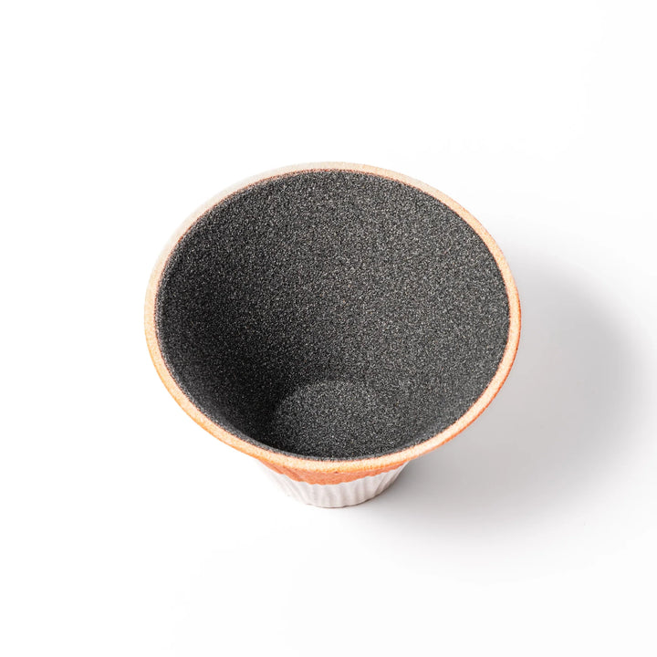 Orange Mount Fuji ceramic coffee filter with snowy peak design, handcrafted in Japan for reusable pour-over brewing and modern kitchen decor.