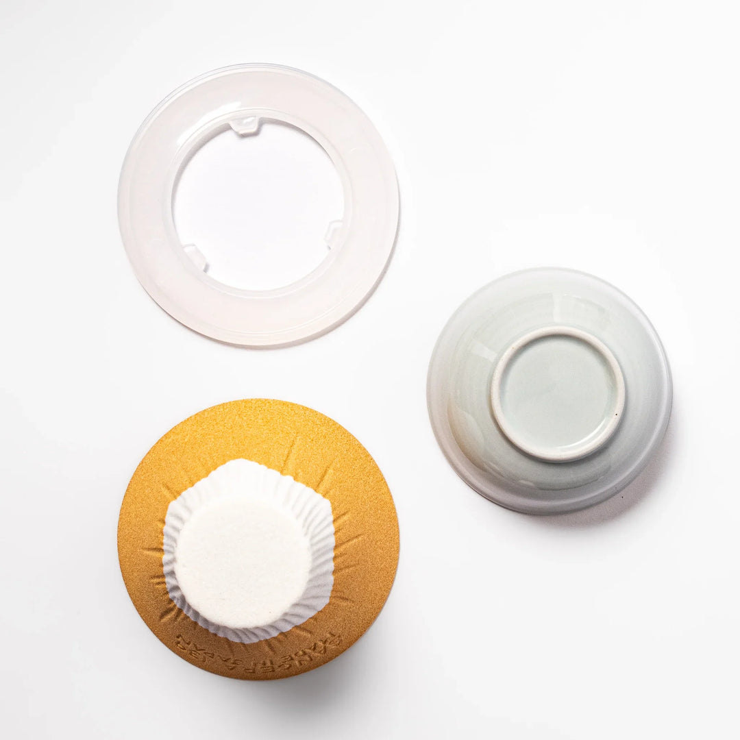 Sunflower yellow Mount Fuji ceramic coffee filter with snowy peak design, handcrafted in Japan for eco-friendly pour-over brewing and decor.