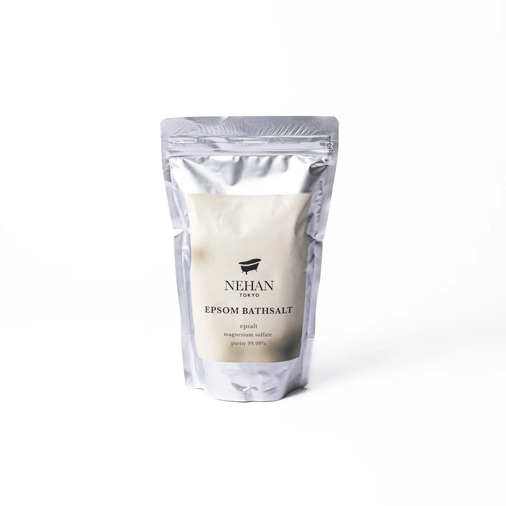 High purity NEHAN TOKYO unscented Epsom salt bath soak in a silver standing pouch for a relaxing magnesium sulfate bath