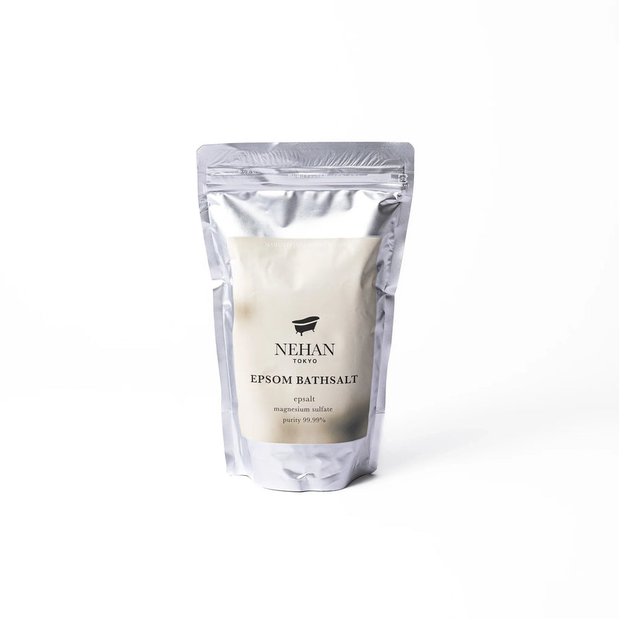 High purity NEHAN TOKYO unscented Epsom salt bath soak in a silver standing pouch for a relaxing magnesium sulfate bath