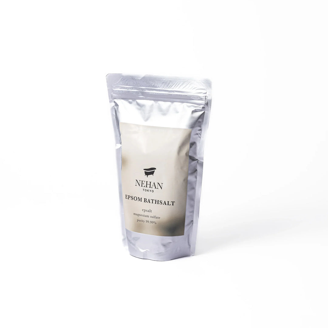 High purity NEHAN TOKYO unscented Epsom salt bath soak in a silver standing pouch for a relaxing magnesium sulfate bath