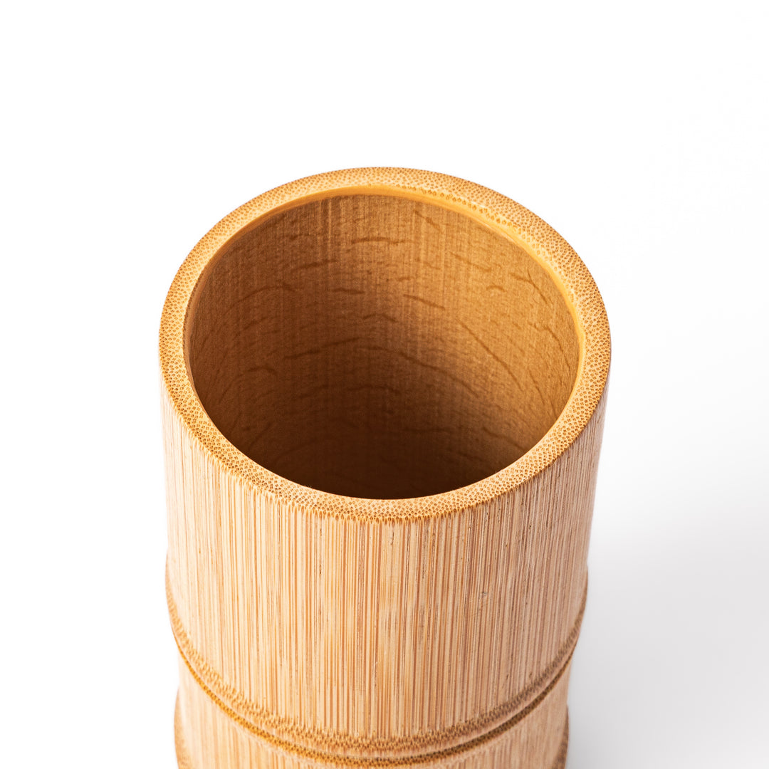 Japanese natural bamboo chopstick stand with visible grain and nodes for organizing utensils or cutlery