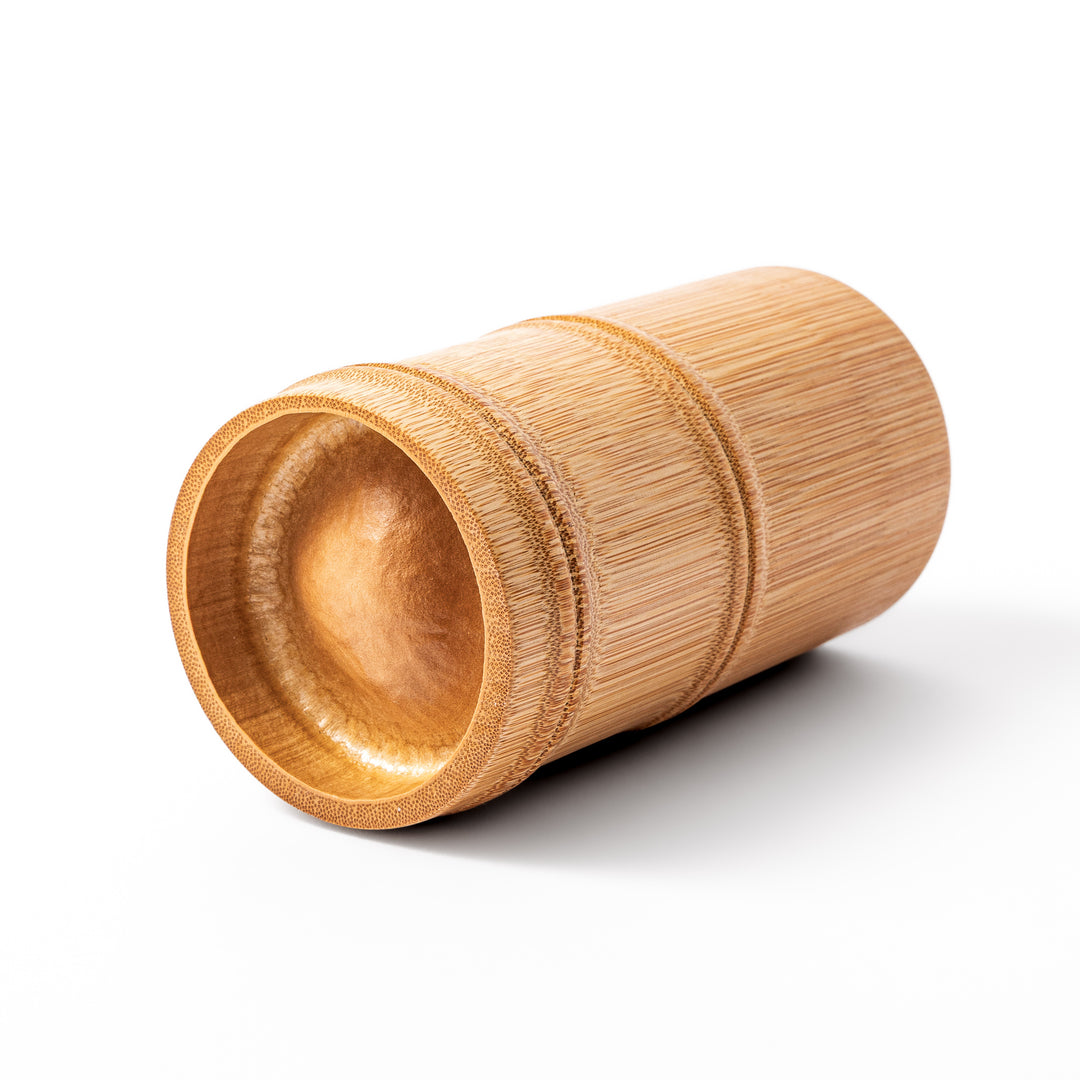 Japanese natural bamboo chopstick stand with visible grain and nodes for organizing utensils or cutlery