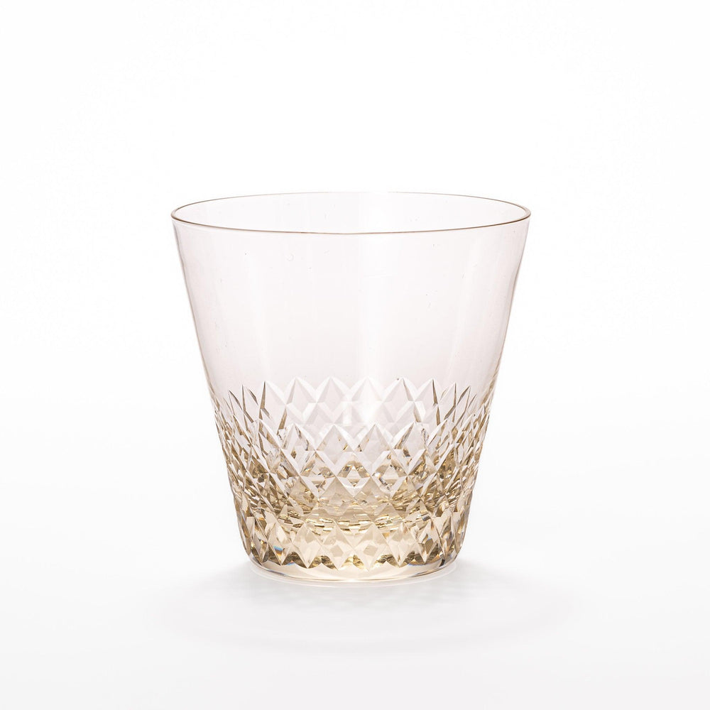 Amber nostalgia rocks glass with diamond-cut base and tapered shape, ideal for whisky, cocktails, or stylish everyday drinks.
