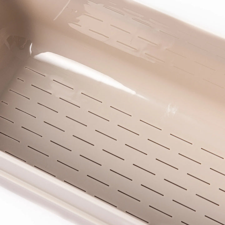 Japanese nukazuke fermentation box with clear lid and black rice paddle for home pickling and storage.