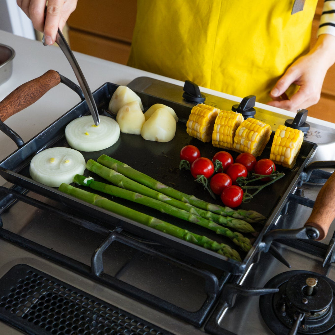 Nami grilling fresh vegetables on aux japanese cast iron griddle with lid rectangular hot plate stovetop bbq pans
