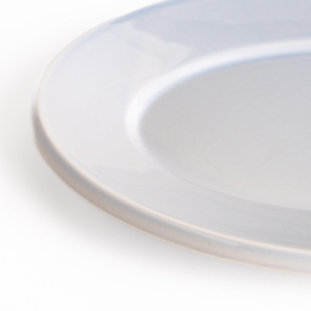 Durable and elegant blue ceramic dinner plate, adding a pop of color to your table setting.
