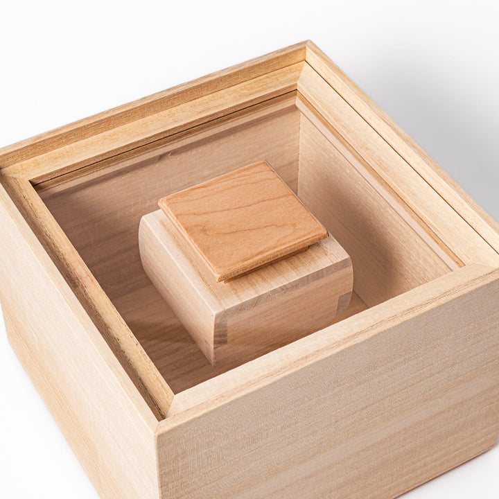 Paulownia wood rice container with airtight lid, handcrafted in Japan to keep rice fresh, lightweight, and naturally moisture-resistant.