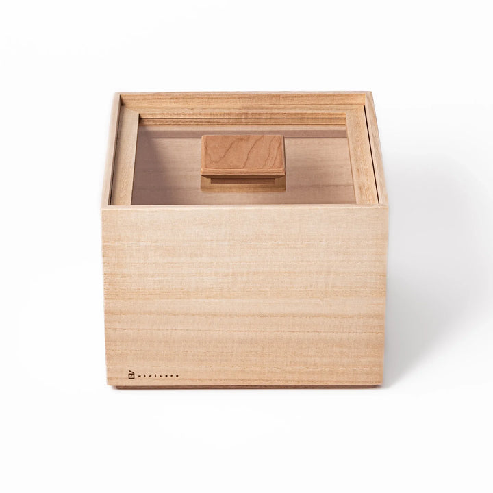 Paulownia wood rice container with airtight lid, handcrafted in Japan to keep rice fresh, lightweight, and naturally moisture-resistant.
